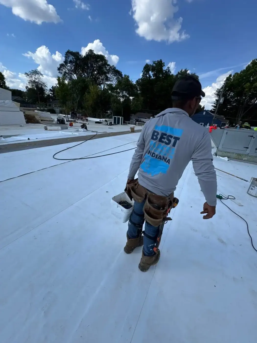 Tarping and dry-in on a Lockerbie Square commercial roof